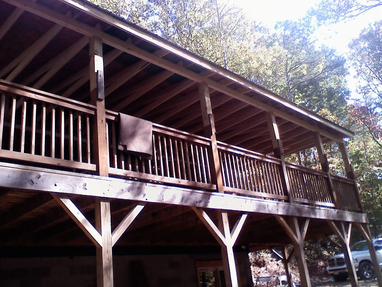 Timber framing under a new elevated porch and deck — Roof Leak Repair in Slickville by Roofing Brothers